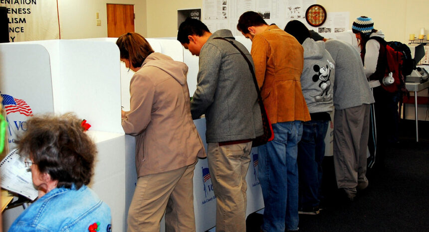 Voters in voting booths