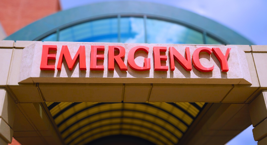 An emergency signs on a hospital building.